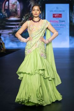 Green tiered ruffle saree featuring resham embroidered  motifs, embellished by sequins, beads and pearls along the waist. Comes with embroidered padded yellow blouse. - Aza Fashions Fitted Green Pre-draped Saree With Ruffles, Green Ruffled Pre-draped Saree For Wedding, Green Ruffled Pre-draped Saree For Reception, Elegant Green Lehenga With Ruffles, Elegant Green Ruffled Pre-draped Saree, Saree Gowns, Cotton Sarees Handloom, Ruffle Sarees, Embroidered Motifs