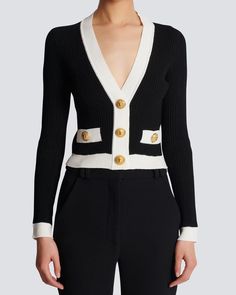 Balmain Noir and Blanc Knit Crop Cardigan V neck Long sleeves Button down front closure Hip welt pockets Gold tone statement buttons Slim silhouette Rib knit fabrication 84% viscose, 16% polyester Made in Italy Knit Crop Cardigan, Military Style Coats, Monsieur Madame, Unique Sweaters, Crop Cardigan, Rib Knit Cardigan, Beach Dresses Summer, Military Style Jackets, Crop Top Sweatshirt