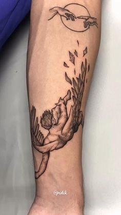 a tattoo on the leg of a person with hands reaching for something in the air