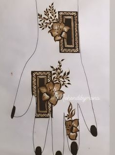 an intricately designed pair of hands with flowers on them and leaves in the middle