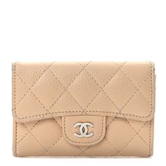 This is an authentic CHANEL Caviar Quilted Flap Card Holder Wallet in Beige. This stylish wallet is crafted of diamond-quilted caviar leather in beige. The cardholder features a rear flat pocket, and a light gold Chanel CC logo on the crossover flap. The wallet snaps open to a light beige fabric interior. Gold Chanel, Chanel Wallet, Chanel Caviar, Beige Fabric, Card Holder Wallet, Cc Logo, Light Beige, Crossover, Card Holder