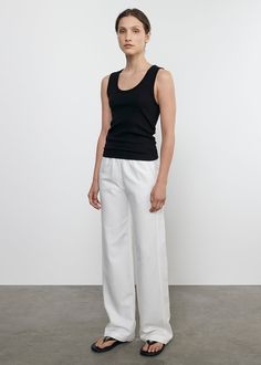 This pant is crafted from Tencel linen twill, which gives it a graceful drape and ensures comfort through breathability, making it a versatile choice for various occasions. Featuring a low to mid-rise and side pockets, the Twill Everywhere Pant is a perfect balance of style and function. Versatile Cotton High-waisted Parachute Pants, Versatile High-waist Cotton Parachute Pants, White Wide-leg Parachute Pants With Pockets, Luxury Wide-leg Cotton Parachute Pants, Non-stretch Cotton Parachute Pants With Pockets, Cloud Bracelet, Mid Rise, Off White, White