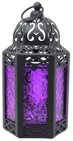 a purple and black lantern with intricate designs