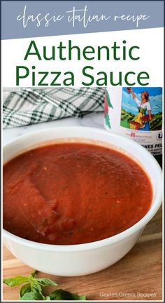 a white bowl filled with pizza sauce sitting on top of a wooden cutting board next to a