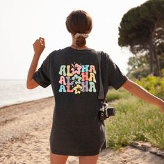 "Aloha Hibiscus Flowers Shirt, Hibiscus Flower Tee, Aloha T-Shirt, Hawaiian Shirt, Hawaii Beach Tee, Funny Aloha Shirts, Cute Summer T-Shirt ☀️☀️☀️☀️☀️ Everything in our shop is hand crafted and made to order. If you want different color or size contact me! If you would like something custom made to fit your personal style please message me and I will do everything to get you that something special. ---How To Order--- ⭐️Please, check and review all photos ⭐️Choose your t-shirt size and color ⭐️Enter your Design Color Example: \"White\" ⭐️Click add to cart. You can go back to add more product ⭐️Click \"Proceed to check out\" ⭐️When you check out, you can add a note to seller for any request *High quality and super soft, comfortable shirt. Made with top of the line vinyl and pressed with a p Multicolor Hawaiian Printed T-shirt, Multicolor Hawaiian T-shirt Relaxed Fit, Multicolor Hawaiian T-shirt With Relaxed Fit, Multicolor Hawaiian Relaxed Fit T-shirt, Hawaiian Style Multicolor Relaxed Fit T-shirt, Hawaiian Short Sleeve Printed T-shirt, Multicolor Short Sleeve Hawaiian T-shirt, Multicolor Short Sleeve T-shirt For Beach, Multicolor Short Sleeve Tops With Hibiscus Print