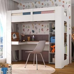 a bedroom with a loft bed and desk