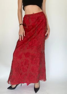 Product Details: Vintage red and black mesh long skirt. Texturized/wrinkled fabric. Has zipper on the back of skirt with clasp. Lays below the knee. Perfect for a formal event or fall weather! Brand: Kay Unger New York Material: 53% Rayon, 47% Polyester Marked Size: 14 Measurements: Waist: 16.5" Length: 45" Hip: 27" Hem: 28" Perfect condition. Model: 5'9" All sales are final. Mesh Long Skirt, Floral Long Skirt, Red Long Skirt, Wrinkled Fabric, Red Midi Skirt, Skirt Aesthetic, Kay Unger, Red Maxi, Langer Rock