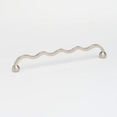 a metal handle on a white background