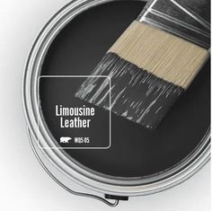 a close up of a paint can with a brush in it and the words nocturine shade