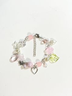 adjustable 8.5" Handmade Whimsical Charm Bracelet For Friendship, Pink Themed Adjustable Charm Bracelet, Adjustable Pink Themed Charm Bracelet, Pink Handmade Themed Bracelets, Handmade Adjustable Whimsical Bracelets, Themed Handmade Pink Bracelets, Handmade Themed Pink Bracelets, Whimsical Handmade Adjustable Bracelets, Pink Adjustable Themed Charm Bracelet