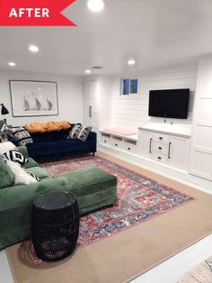 a living room filled with furniture and a flat screen tv mounted to the side of a wall