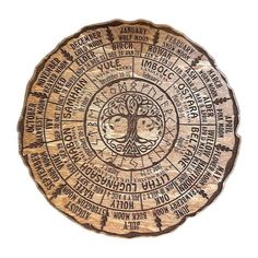 the tree of life is carved into a wooden plaque with words written in different languages