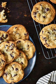 chocolate chip cookies on a plate next to cooling rack