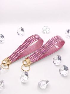 a pink leash with lots of diamonds around it