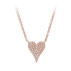 There are 56 diamonds pave set into this uniquely shaped heart.  The heart is slightly elongaged at almost 1/2 and inch long and 1/3 inch wide. The chain is 14k gold and adjustable at 16,17, and 18 inches. Worn on its own or as a layering piece, it is a great addition to your jewelry wardrobe. Heart-shaped Pave Setting Fine Jewelry Necklace, Heart Shaped Pavé Setting Necklace In Fine Jewelry Style, Valentine's Day Diamond Necklace With Pave Setting, Valentine's Day Heart-shaped Diamond Necklace With Pave Setting, Valentine's Day Heart Necklace With Pave Setting, Heart-shaped Necklace With Pave Setting, Valentine's Day Heart Necklace With Single Cut Diamonds, Wedding Ring Guide, Top Engagement Rings