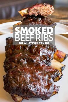 grilled beef on a white plate with text overlay that reads smoked beef ribs or whatever you do