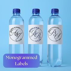 three bottled water bottles with labels on them for monogrammed label designs and their names