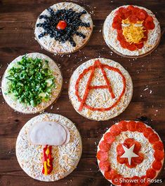 four pizzas decorated to look like avengers