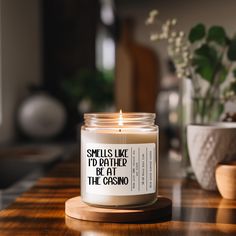 a candle sitting on top of a wooden table