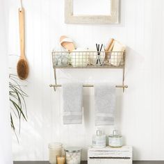 the bathroom is clean and ready to be used as a storage area for toiletries