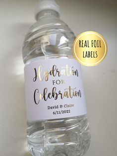 a water bottle label with the words celebration for celebration written in gold foil on it