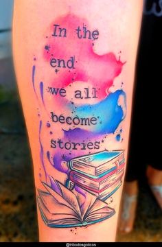 a person with a tattoo on their leg that says in the end we all become stories