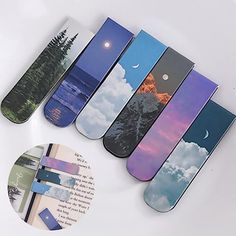 five skateboards are lined up in a row and one is on top of the other