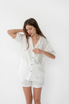 "When ordering you can choose to have the \"SHORTS\" or \"TOP\" only or the whole \"PAJAMA SET\" of both items. When buying a set you save 5 euro. White ALEXIS short sleeve shirt and ELLA shorts with pockets. TOP: - length is ± 72 cm (28\") (depends on size) - coconut buttons closure - short sleeves - with pockets BOTTOM: - outseam ± 38 cm (14.9\") (depends on size) - inseam is ± 10 cm (3.9\") - elastic waistband with fabric strap - two side pockets DETAILS: - 100 % European, pre-washed medium w Bridesmaids Pajamas, Linen Sleepwear, Monogrammed Pajamas, Matching Bridesmaids, Luxury Pajamas, Pockets Details, Bridesmaid Getting Ready, Bridesmaid Pyjamas, Linen Pajamas