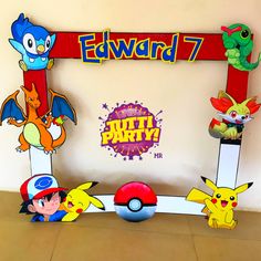 the pokemon birthday party is set up with paper cut outs