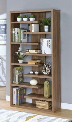 a book shelf with books and other items on it