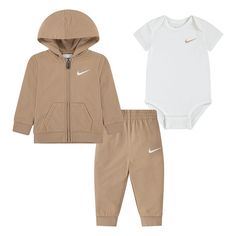 Made with a soft knit, this baby Nike bodysuit, full-zip hoodie, and sweatpants matching set is perfect for easy dressing and mixing and matching. Click on this BABY ESSENTIALS & APPAREL GUIDE to find everything you need to keep your baby healthy and happy! FEATURES 3-piece set includes: bodysuit, hoodie, and pants Bodysuit: short sleeves with lapped shoulders, crewneck, and inseam snap closure Hoodie: midweight, attached hood, long sleeves, non-functional kangaroo pocket, and full zipper closur Nike Bodysuit, Baby Sweats, Nike Set, Hoodie And Pants, Baby Nike, Neutral Baby Clothes, Baby Boy Clothes Newborn, Cute Nike Shoes