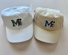 Embroidered Mickey Mouse M Logo. "Mickey" Embroidered on back. Adjustable Strap. 52cm Head Circumference (~3-5y) Disney Items are Final Sale. Casual Cotton Hats With Mickey Mouse Detail, Casual Cotton Mickey Mouse Hats, Casual Mickey Mouse Baseball Cap, Disney Items, Kids Hat, M Logo, Toddler Kids, Kids Hats, Baseball Hat