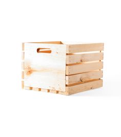 a wooden crate sitting on top of a white surface