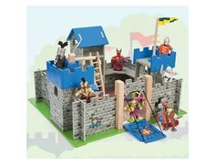 a toy castle with people on it