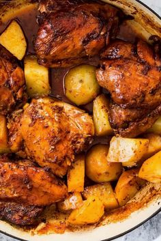 chicken, potatoes and gravy in a skillet