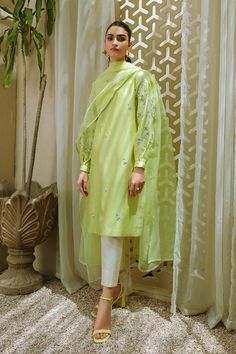 Lime green short pakistani designer kurti with embroidered puff sleeves,green silk kameez with white straight pant, festive wear, designer wear, plus size indian dress, kurti pant suit, salwar kameez ✨This beautiful lime green straight silk kurta has resham thread embroidery over the sleeves, it has white silk straight pant. Organza dupatta has lace border ✨Dazzle with this indo western dress in any party or wedding function. ✨We stitched outfit with lot of care, so that our customers should not Pakistani Fashion Casual Party Wear, Floral Suits Women Indian, Net Fabric Dress Design, Pakistani Kurta Designs Women, Pakistani Kurti Designs, Silk Kameez, Indian Designer Dresses, डिजाइनर कपड़े, Pakistani Salwar Kameez