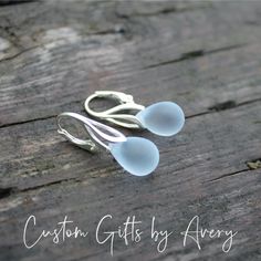 These cultured sea glass earrings are made with high-quality frosted glass that resembles ocean tumbled sea glass, but is consistent in shape, colour, and size and comes at a fraction of the price. These gorgeous little gems come in a variety of colours and are hung on high quality, nickel-free sterling silver lever backs.  * Glass drops measure 14mm long x 10mm wide * Dangles measure 28mm long (from top of lever back to bottom of glass drop) For more colours please visit:  https://www.etsy.com/ Sea Glass Jewelry Earrings, Sea Glass Jewelry Diy, Earrings Beach, Silver Sea, Hawaiian Jewelry, Sea Glass Earrings, Blue Sea Glass, Sea Glass Necklace, Sea Glass Art