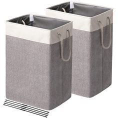 two gray and white storage bags with handles on each side, one is holding an empty bag