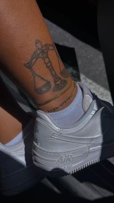 a person with a tattoo on their leg