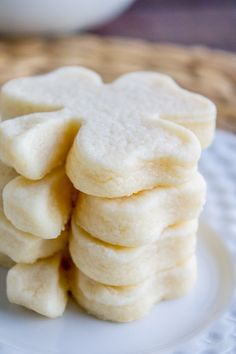 a stack of cookies sitting on top of a white plate