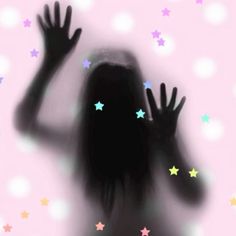 the silhouette of a woman with her hands up in front of stars on a pink background