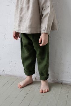 Unisex pants are made of 100% soft medium weight linen. Pants are suitable for both girls and boys. Details: - Choose size and embroidery in the drop down menu - Please write your preferred colour in the personalization bar (in the bottom of the drop down menu) - Composition: 100% Oeko-Tex certified linen - Medium weight linen - Unisex - Relaxed look - Linen care: machine wash gentle; tumble dry low, ironing optional - The price is for one pair of pants, other pictured items are not included Green Linen Harem Pants With Elastic Waistband, Green Linen Trousers, Green Linen Pants, Kids Linen, Baby Apron, Unisex Pants, Linen Tunic, Loose Shirts, Linen Blouse