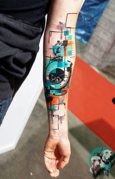 a person with a colorful tattoo on their arm