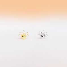 Experience the elegance and luxury of our Little Footprint Stud earrings. Made with exquisite s925 silver and designed with an internally threaded flat back, these earrings are not only cute but also comfortable to wear. Add a touch of sophistication to any outfit with our Little Footprint Stud earrings. Detail： -Material: External gold plated with internal s925 Sterling Silver or S925 Sterling silver -Nickel free. -Suitable for sensitive skin. -Tarnishing is completely natural. Be sure to have Ear Piercing Studs, Fall Essentials, Star Studs, Belly Rings, Chain Earrings, Ring Necklace, Caribbean Netherlands, Body Jewelry, Ear Piercings