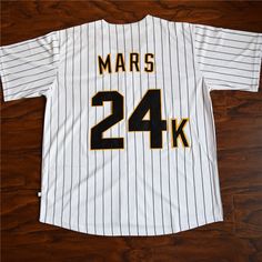 💰 Save $60✈️ Free Shipping Worldwide🔒 100% SSL Secured Safe Checkout Bruno Mars Jersey Are you a real Bruno Mars fan? It is really worth to get this baseball jersey. The name and numbers are all stitched. Features Made of Mesh Fabric: The jersey is made of 100% polyester mesh fabric. It is breathable and quick dry. Embroidery Tracking Twill: All letters and numbers of the jersey are all stitched. Comparing with the printed jerseys, it is durable and good-looking. For Daily Wear and Sports: The Team-colored Baseball Jersey With Moisture-wicking, Breathable Baseball Jersey For Game Day, Breathable Baseball Jersey, Baseball Fan Apparel Jersey For Streetwear, Collegiate Breathable Baseball Jersey, Baseball Jersey With Collar For Sports Season, Baseball Fan Merchandise Jersey With Baseball Collar, Varsity Style Baseball Jersey For Baseball Season, Streetwear Jersey For Baseball Season