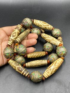 Beautiful old antique pumtek pyu beads with enamel bead necklace Antique Round Beaded Necklaces With Large Beads, Unique Polished Beads For Festivals, Traditional Green Beaded Necklaces With Wooden Beads, Antique Style Colorful Beads For Gift, Traditional Green Beaded Necklace With Wooden Beads, Antique Beaded Necklaces With Large Round Beads, Artisan Carved Beaded Necklaces With Round Beads, Antique Beaded Necklaces With Large Beads For Gifts, Antique Polished Beads As Gift