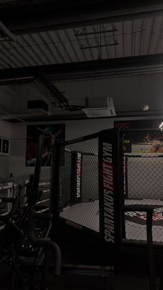 the inside of a boxing ring at night