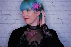 With a touch of silver and a splash of vibrant color, this necklace with 3D printed geometric flower pendant adds just the right wink of uniqueness to any look! (And just wait until you see it glow under blacklight!)This pendant necklace is printed with TPU filament, a flexible, translucent plastic, and printed on an Anet AM8 3D printer. The fine lines--each one less than a quarter of a millimeter thick--that make up each layer adds a dimension that makes them almost shimmer in light. And this l Handmade Geometric Jewelry For Party, Geometric Pink Jewelry For Gifts, Geometric Pink Jewelry For Gift, Pink Geometric Jewelry For Gifts, Pink Geometric Jewelry For Gift, 3d Printed Pendant, Neon Necklace, Mod Jewelry, Pink 3d