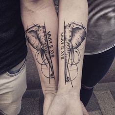 two people are holding hands with tattoos on their arms, one has an elephant and the other has a compass