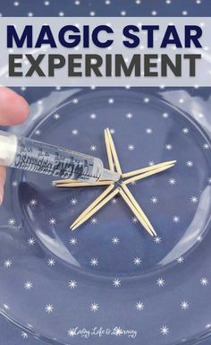 a person holding a syring in their hand with the words magic star experiment on it